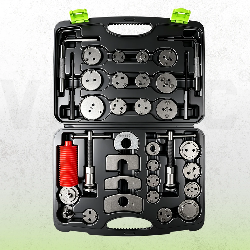 VIKTEC 35-piece brake caliper piston wind back kit featuring multiple adapter discs, two threaded rewind tools, reaction plates and brake servicing accessories organized in a molded storage case.