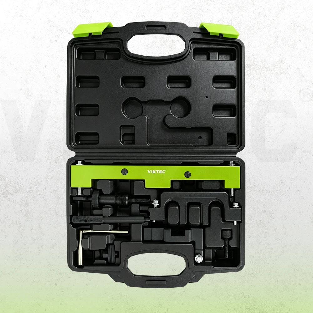 Open case showing the green twin VANOS alignment plate and black camshaft / crankshaft timing tools supplied with VT01523