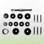 Components of a front wheel drive bearing service kit, including adapter discs, receiver cups, threaded spindle and multiple forcing screws