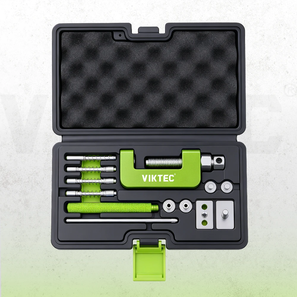 Professional chain breaker and riveter kit with multiple breaking pins, riveting adapters and fitted carrying case