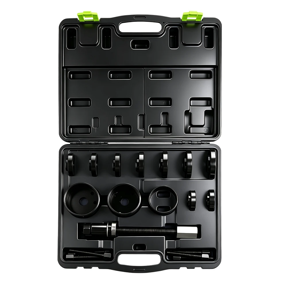Front Wheel Drive Bearing Removal and Installation Kit 2 Front wheel drive bearing service kit with adapter discs, receiver cups, threaded spindle and forcing screws organized in a black carrying case on a white background