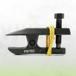 Heavy-duty VIKTEC ball joint separator for automotive suspension repair, shown with a yellow safety cord on a textured white and green background.