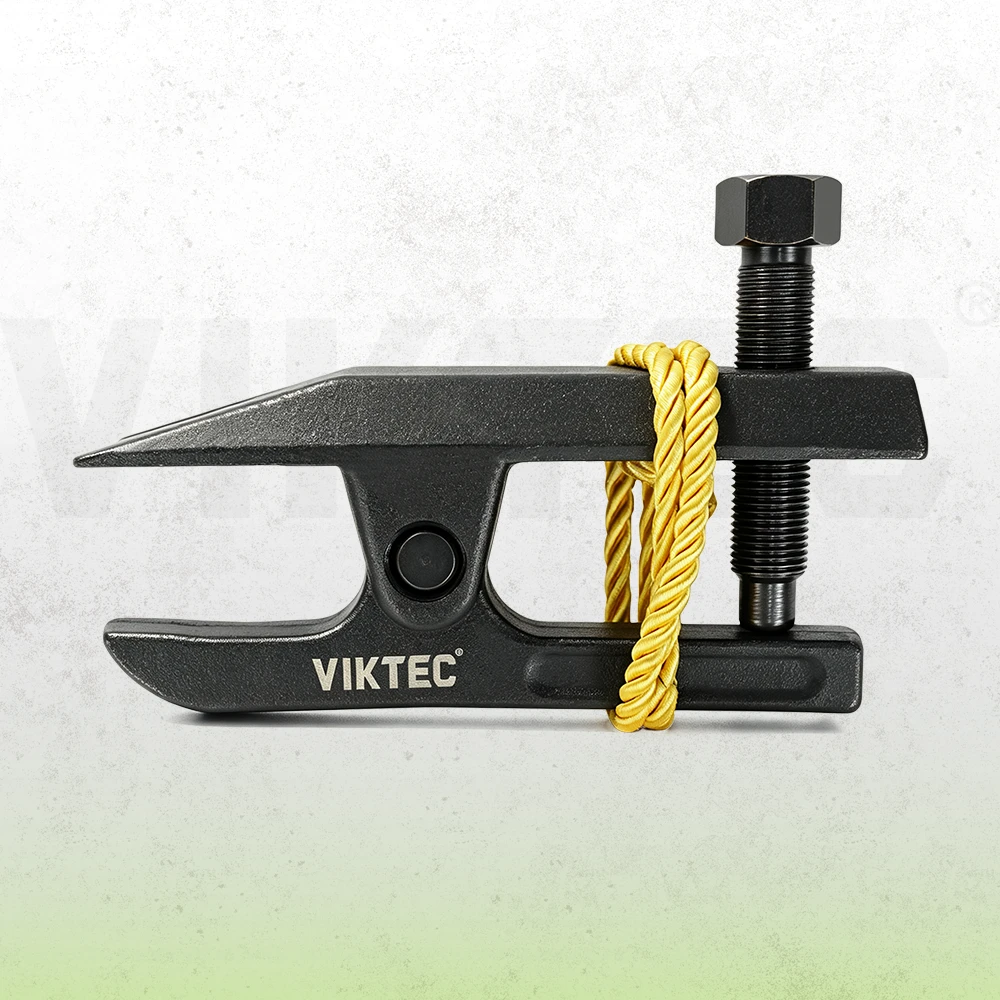 Heavy-duty VIKTEC ball joint separator for automotive suspension repair, shown with a yellow safety cord on a textured white and green background.