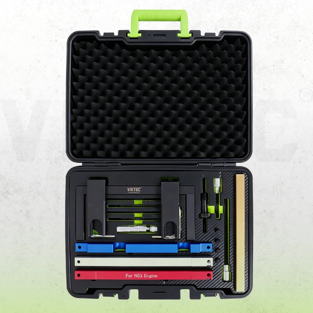 BMW six-cylinder petrol engine timing tool set for N51 through N55 engines with color-coded alignment plates, locking pins and spark plug sleeve in a foam-lined case