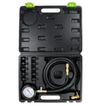 Open VIKTEC automotive oil pressure test kit with pressure gauge, flexible hose and multiple threaded engine adaptors in a molded carrying case.