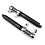 Dos compresores de resortes helicoidales de alta resistencia con cuerpos roscados, ganchos de retención de seguridad y accionamientos hexagonales de 19 mm para la reparación de puntales.