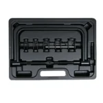 VT01030A Outil de compression pour ressorts de soupapes, doté d'un châssis réglable et d'un mécanisme de compression fileté, destiné au démontage et au montage des ressorts de soupapes du moteur.